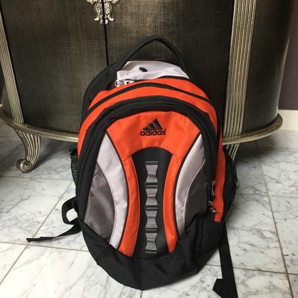 orange and black adidas backpack